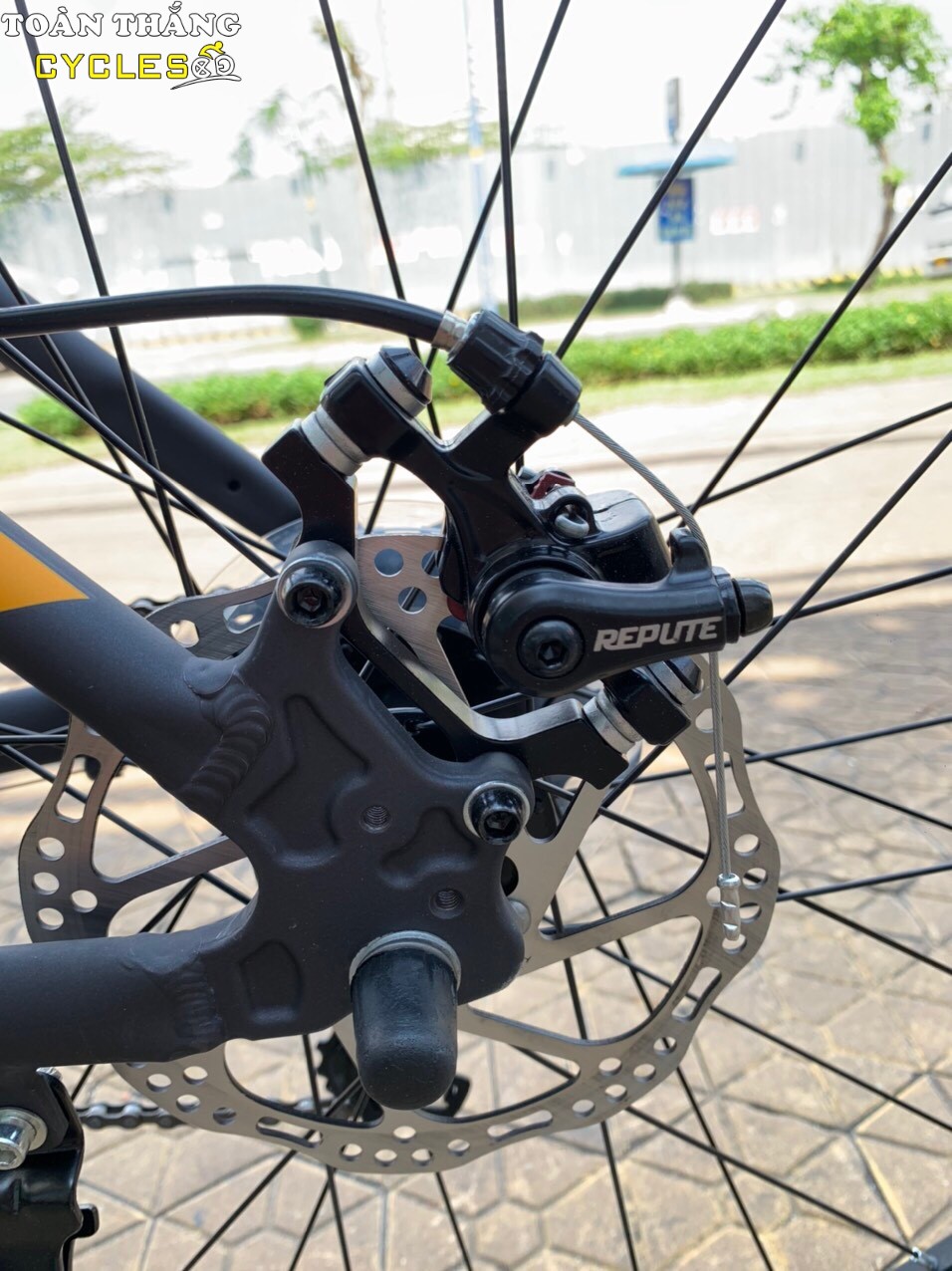 Xe đạp địa hình TrinX M116 2021 Đen cam