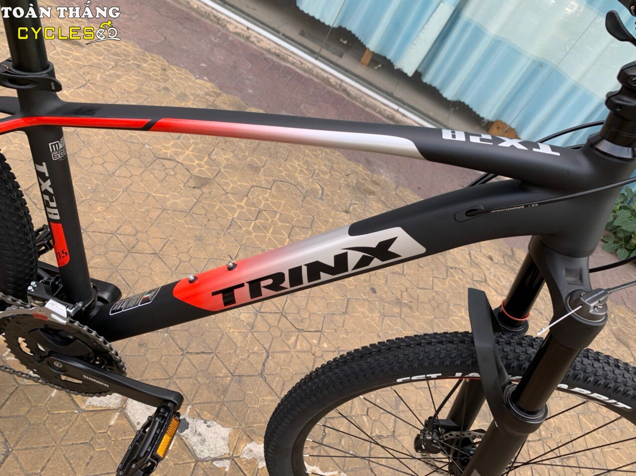 Xe đạp địa hình TRINX TX28 2021 Đen đỏ