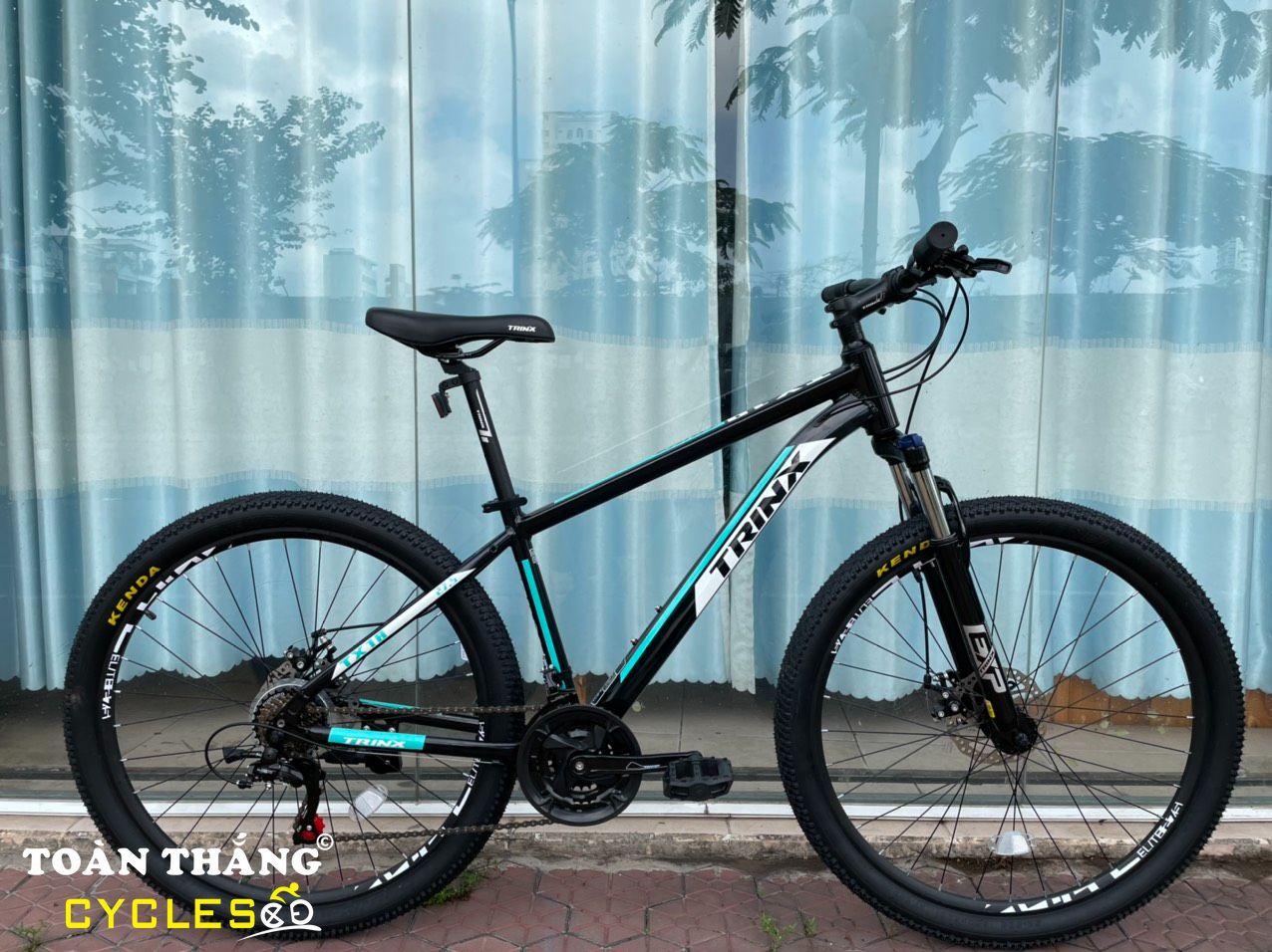 Xe đạp địa hình TrinX TX18 27-5 2020 Đen Xanh Ngọc