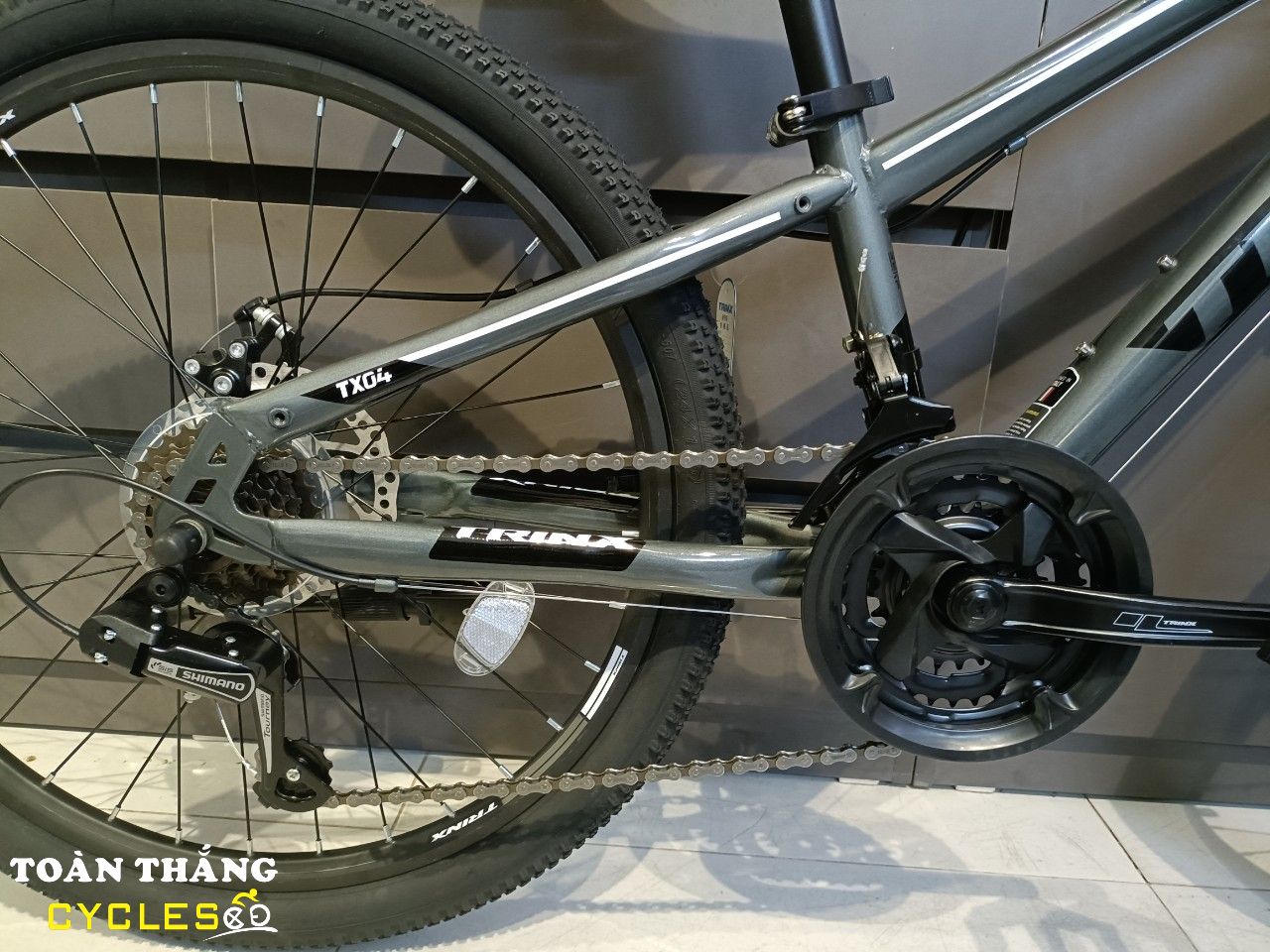 Xe đạp địa hình TrinX TX04 2021 Xám đen