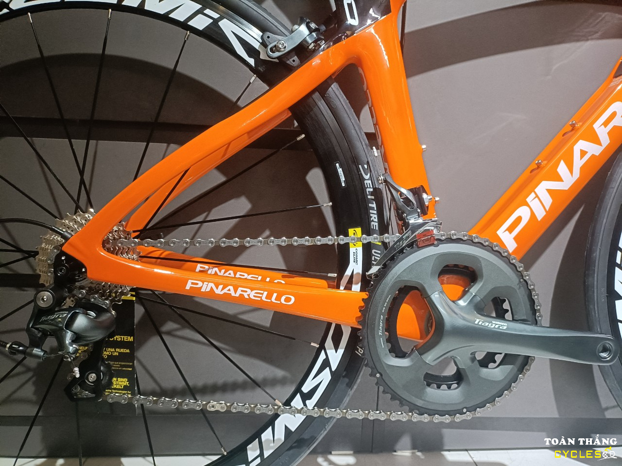 Xe đạp Thể thao Pinarello F10 Tiagra R4700 Cam Đen Trắng
